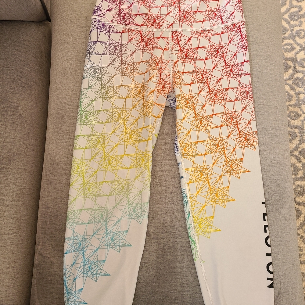 WITH peloton pride capris
